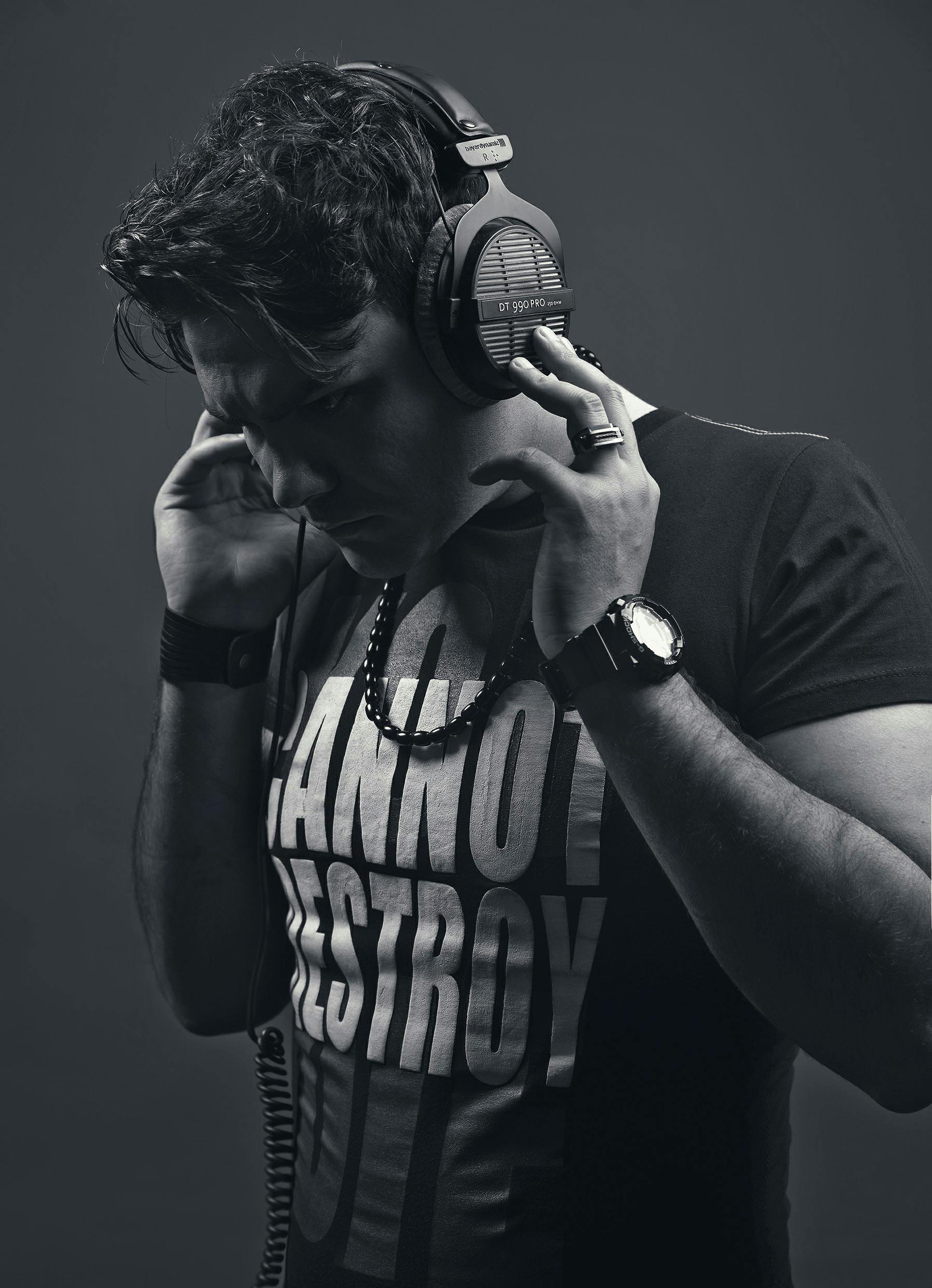 man listening to music with headphones